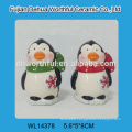 Handmade ceramic candle holder with penguin design